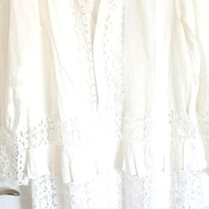 Beautiful ladies dress brand new  Size med , eyelet design  separate lining .
